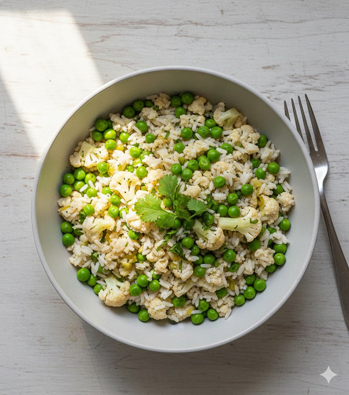 Bowl de coliflor, guisantes y arroz